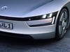 Volkswagen XL1. Диск, фара, шильдик "VW"