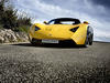 Marussia B1 на загородной трассе, вид спереди