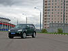 Тест-драйв Land Rover Freelander 2. Автомобиль на фоне городской панорамы Тест-драйв Land Rover Freelander 2. Автомобиль на фоне городской панорамы