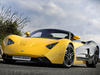 Marussia B1 на загородной трассе, вид спереди
