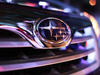 Шильдик "Subaru" на решетке радиатора