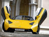 Marussia B1 с открытыми дверями, вид спереди