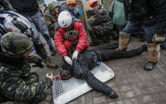 Раненый на площади Независимости в Киеве © РИА Новости, Андрей Стенин