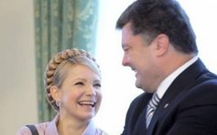 Юлия Тимршенко и Петр Порошенко. Фото с сайта news-front.info