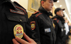 Жетон сотрудника МВД РФ © РИА Новости, Алексей Филиппов