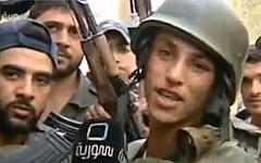 Боец сирийской армии дает интервью. Стоп-кадр с видео в YouTube