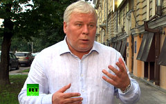 Анатолий Кучерена. Кадр канала Russia Today