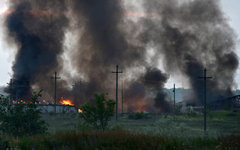 Пожар на складе боеприпасов в Луганской области © РИА Новости, Евгений Биятов