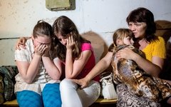 Жители Славянска в подвале школы во время обстрела © РИА Новости, Андрей Стенин