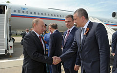 Владимир Путин и и.о. главы Крыма Сергей Аксенов © РИА Новости, Алексей Дружинин