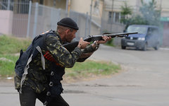 Ополченец во время боев под Луганском © РИА Новости, Евгений Биятов