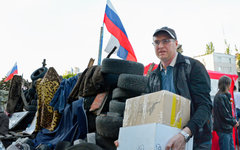 Разгрузка гуманитарной помощи из России © РИА Новости, Наталья Селиверстова