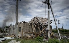Разрушенный дом в Луганской области © РИА Новости, Валерий Мельников