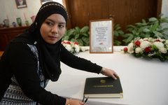 Книга соболезнований в посольстве Малайзии. © РИА Новости, Кирилл Каллиников