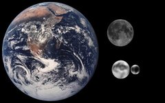 Земля и Луна в сравнении с Плутоном и Хароном. Изображение с сайта wikimedia.org