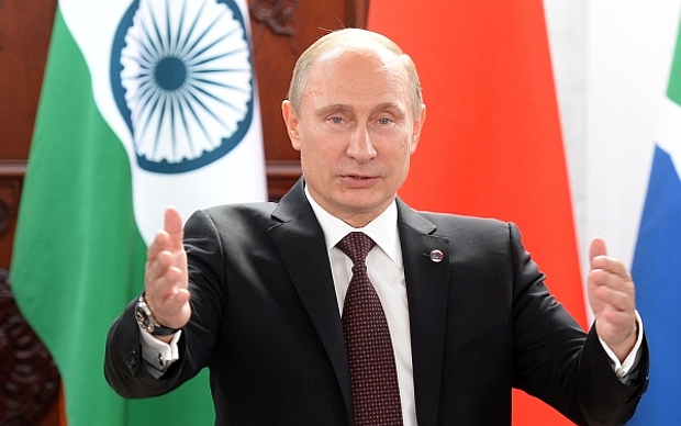 Владимир Путин на встрече глав делегаций стран-участниц БРИКС © РИА Новости, Александр Вильф Владимир Путин на встрече глав делегаций стран-участниц БРИКС © РИА Новости, Але