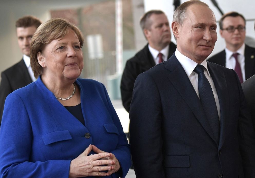 Путин и Меркель на Международной конференции по Ливии в Берлине 