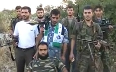 Сирийские боевики. Кадр из видео в YouTube Сирийские боевики. Кадр из видео в YouTube