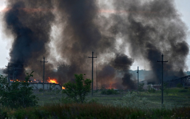 Пожар на складе боеприпасов в Луганской области © РИА Новости, Евгений Биятов Пожар на складе боеприпасов в Луганской области © РИА Новости, Евгений Биятов