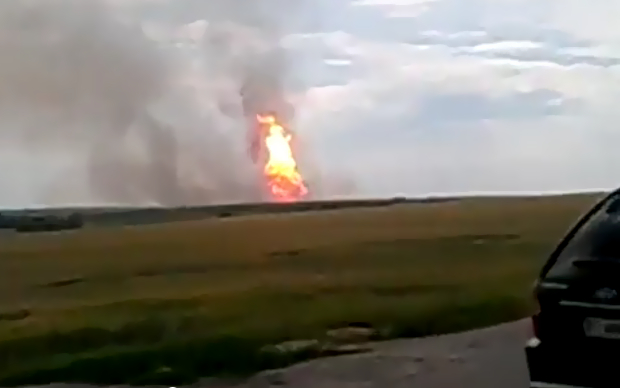 Место взрыва. Кадр из <a target="_blank" href="http://www.youtube.com/watch?v=7BIsofM_WRA">видео</a> в YouTube Место взрыва. Кадр из видео в YouTube